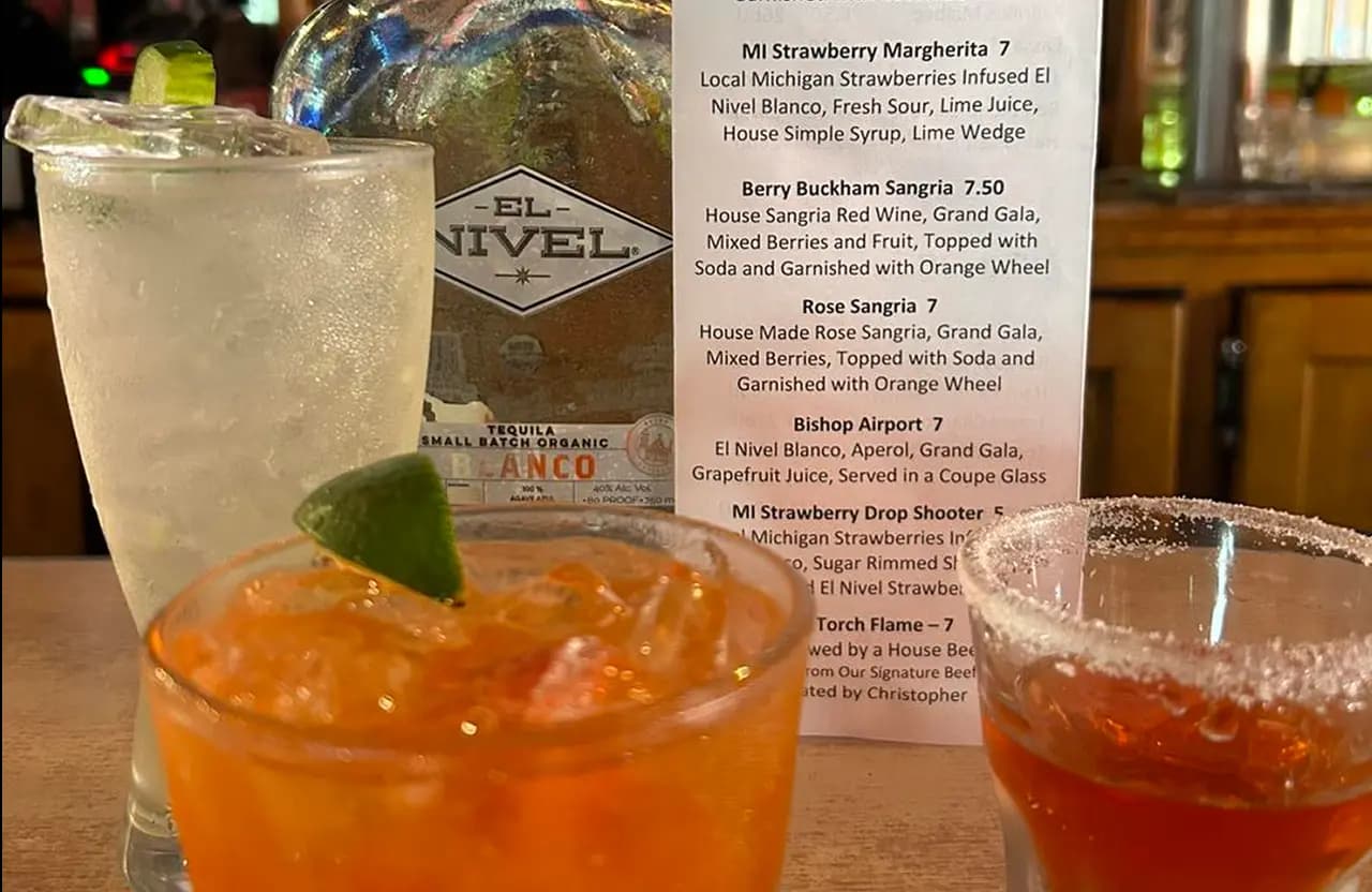 Colorful cocktails lined up on the Torch bar counter